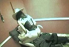 Oversexed prostitute wearing cowboy hat rides hard cock
