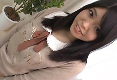 Cute Japanese sweetheart posing in her adorable white tunic
