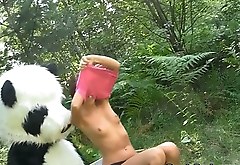 Sexy strap on fuck with young pretty faced artist outdoor