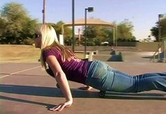 Affectionate blonde in jeans skating lovely in reality shoot outdoor
