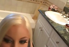 Blonde babe titfucking cock while on the phone