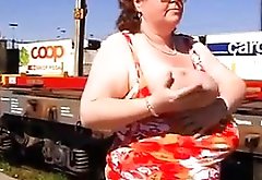 Mature Woman Shows Off Her Tits Outside