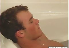 These two horny guys get into some wet & wild action in the bathtub.  Both guys in the tub get into some hardcore oral action, then the action con