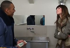 Dirty Russian slut gives a head to black huge dick in public toilet