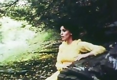 Vintage brown haired slut wearing polka pop dress gives outdoor blowjob