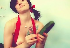 Freaky raven haired teen performs dirty solo using big cucumber