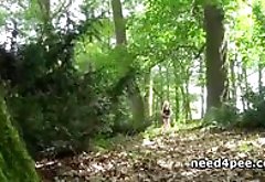 Amateur babe squatting and pissing in the woods