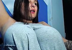 Sexy brunette plays with her fake and massive tits in fro Any Porn
