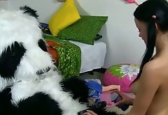 Raven haired slutty gal pokes her mouth with big black fuck toy