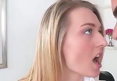 Luscious blond student kneels down to mouth fuck oversized penis