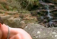 Sexy chick Charmane Star gives unforgettable blowjob in flying 69 pose near the waterfall