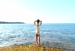 Shiny Asian fairy Rika Kawamura poses on cam on the sea shore