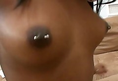 Ebony brunette with pierced nipples rides and sucks strong white cock