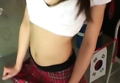 Hikari rubs her pussy with rope under skirt