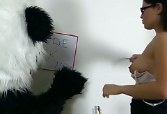 Young and naughty teacher fucks huge toy bear in the classroom