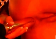 A smoking hot and exotic babe is masturbating