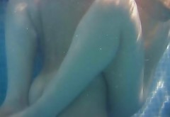 Two foxy brunette amateurs cannot stop finger fucking each other being in pool
