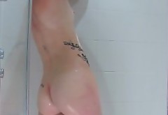 Daisy washing her hairy pussy in the shower