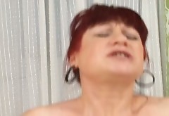 Naughty red haired milf gets her ginger pussy fucked doggy style