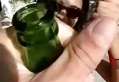 Hussy Asian girlfriend is drinking beer and masturbating on a balcony
