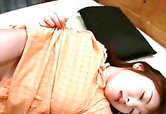 Adorable Japanese teen turned on with pussy play