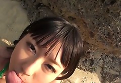 Japanese angel Megumi Haruka shows off her boobs while giving blowjob