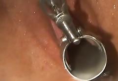 Four-eyed harlot toys her pussy and gives hot blowjob