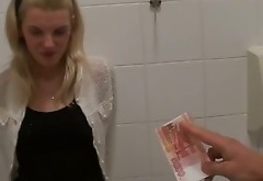Cheap blond slut gives double mouth fuck in public toilet