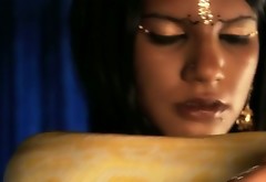 Dark skin brunette Indian babe plays and tames a python