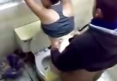 Slutty dark haired bitch gets her hole drilled in the toilet
