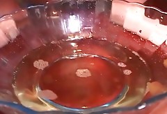 Japanese hussy Nanami Komachi pisses in a bowl