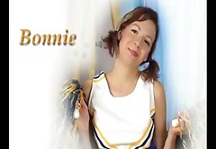 Skinny cheerleader Bonnie pokes her twat with sex toy