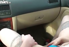Naughty teen plays with dildo in the car