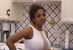 Gorgeous Indian babe flashes her big boobs in the kitchen