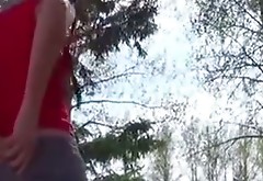 Whorish brunette teen with pigtails performs dirty solo in woods