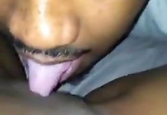 eating pussy and teasing clit with his tongue