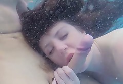 Super adorable babe gives eager blowjob under the water