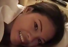 Cute Asian girlfriend gives her boyfriend sucking job