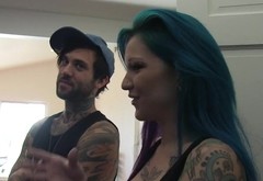 Tattooed guys and girls having great fun with each other