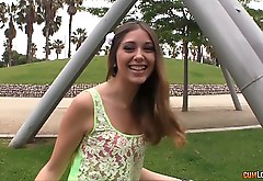 Pretty teen chick shows her tats in the park
