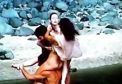 Long haired brunette cutie licks and kisses sweet penis of her BF in water