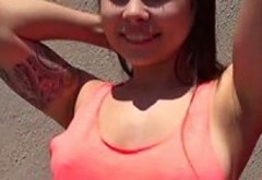 Shameless girl giving head outdoor in a public place