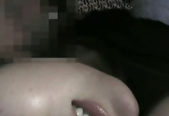 Alluring Japanese black head teases her hairy pussy with sex toy
