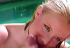 Playful blonde enjoys sucking meaty pole by the pool side