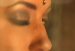Deep sexy eyes of stunning Bollywood star in a hot teasing sex video