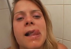 Dirty blond teen gets her faced sprayed with man's urine