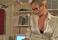 Sexy Stocking Teasing MILF in Busy Office