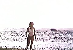 All wet and naked vintage brunette nympho gets hairy cunt licked on beach