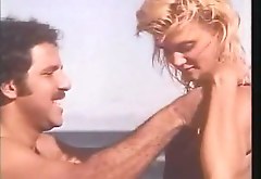 Charming vintage blondie with big ass rides fat dick on Hawaiian beach