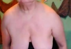 Good looking granny in sexy black lingerie masturbation
